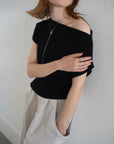 Unbalance tuck top