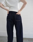 Belt curve denim pants