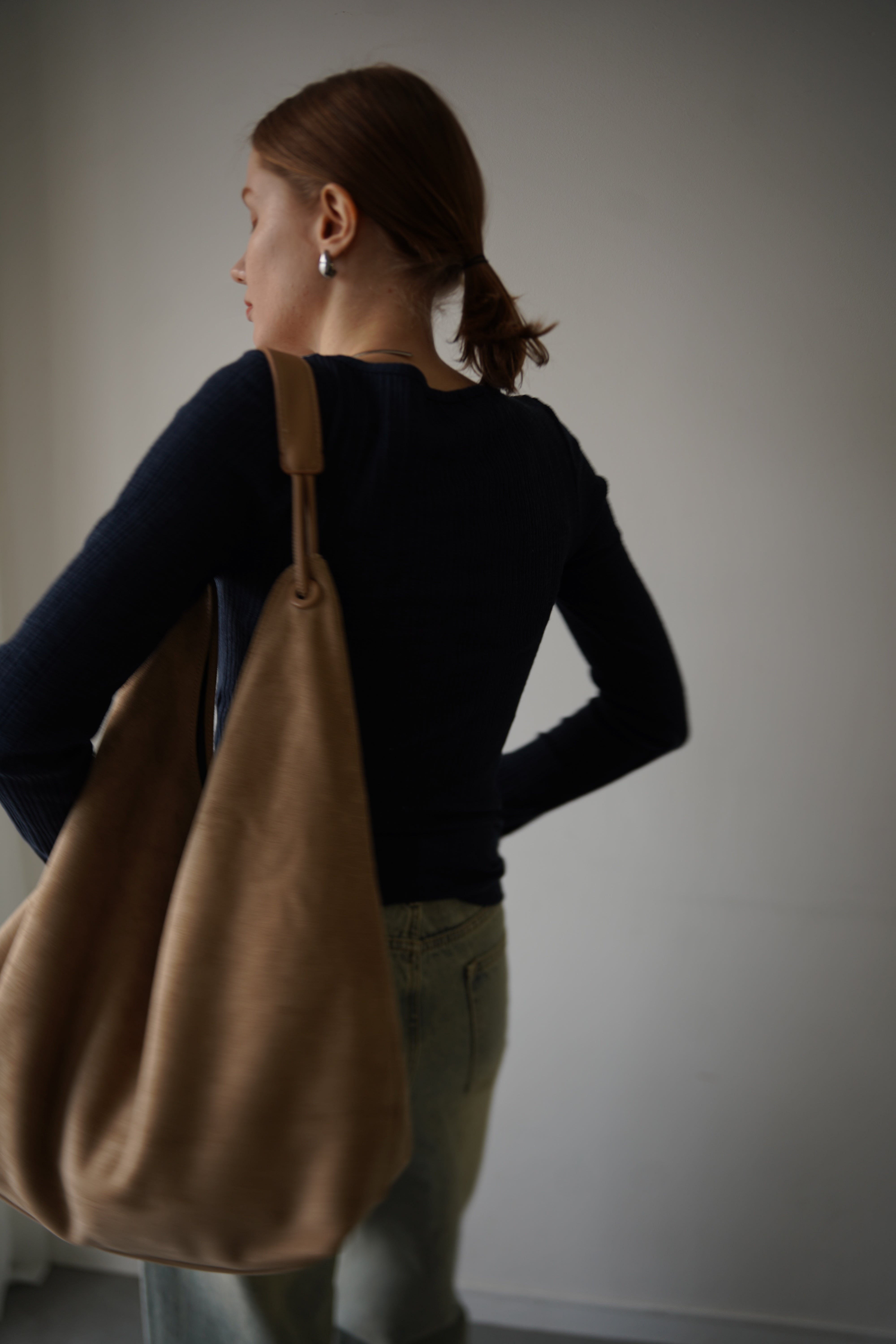 Suède round taught bag
