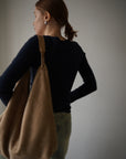 Suède round taught bag