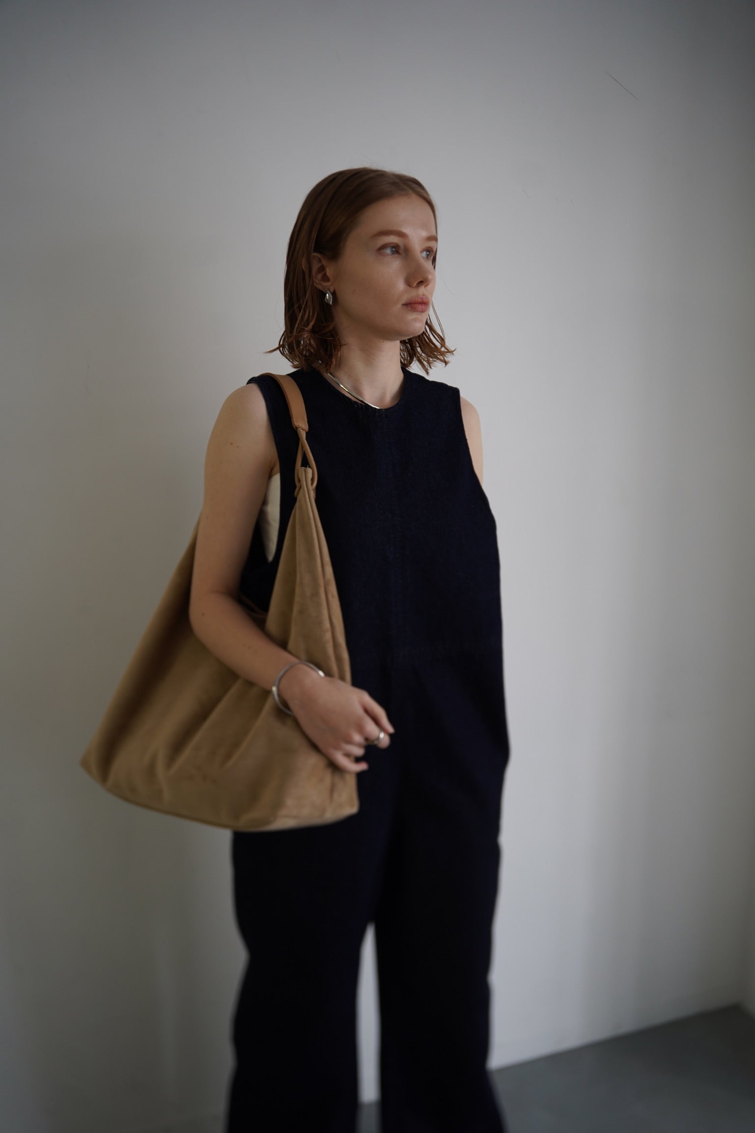 Suède round taught bag