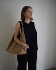 Suède round taught bag