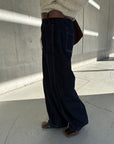 Belt curve denim pants