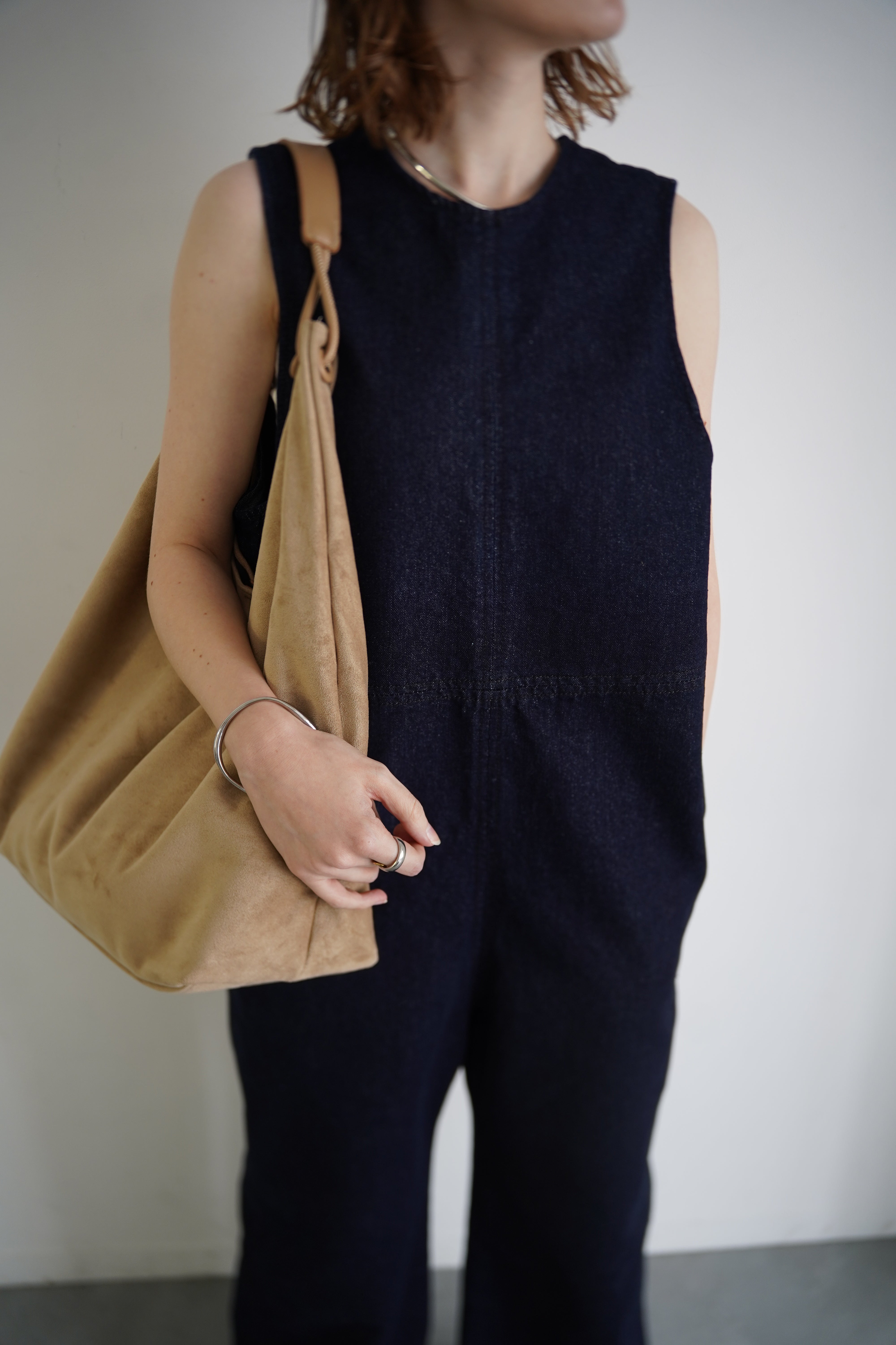 Suède round taught bag