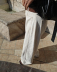 Belt curve denim pants