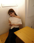 Unbalance tuck top