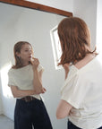 Unbalance tuck top
