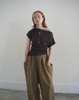 Unbalance tuck top