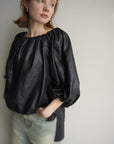Leather like off shoulder top