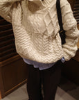 Asymmetric cable knit