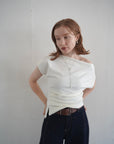 Unbalance tuck top