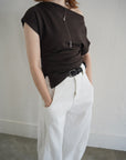 Unbalance tuck top
