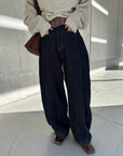 Belt curve denim pants