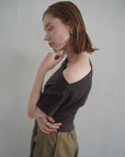 Unbalance tuck top
