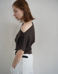 Unbalance tuck top