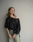 Leather like off shoulder top