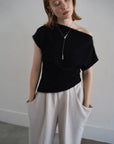 Unbalance tuck top