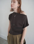 Unbalance tuck top
