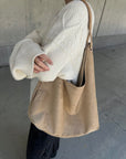 Suède round taught bag