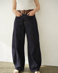 Belt curve denim pants