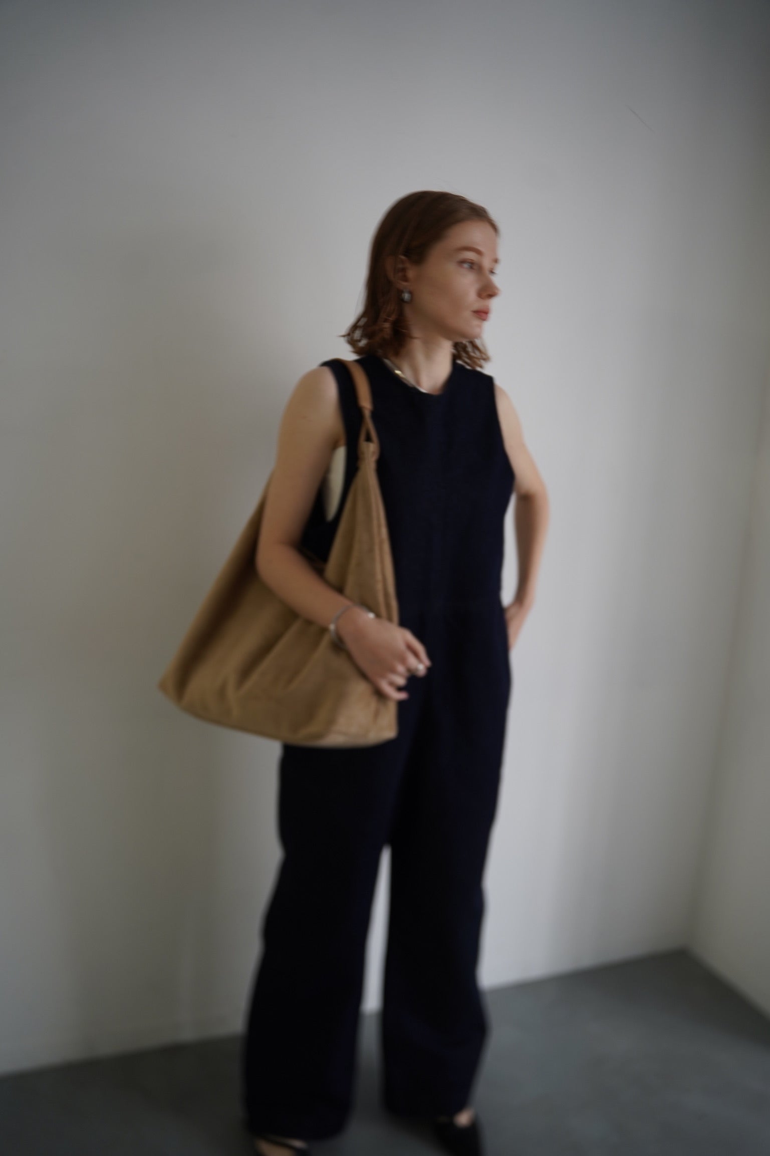 Suède round taught bag