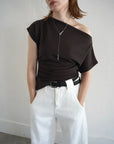 Unbalance tuck top