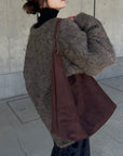 Suède round taught bag