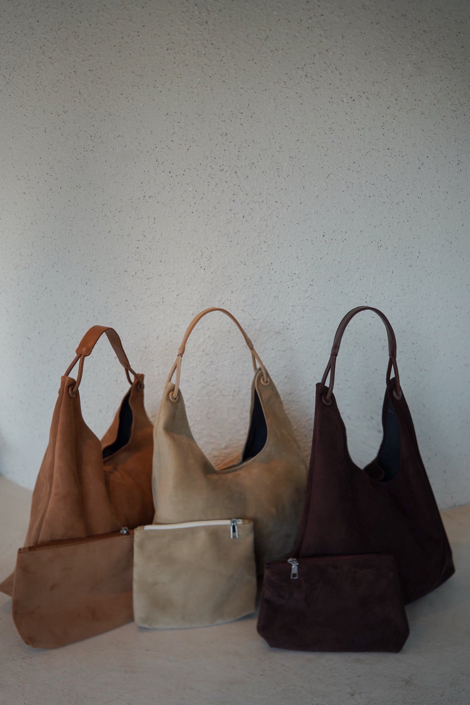 Suède round taught bag