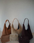 Suède round taught bag