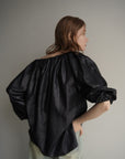 Leather like off shoulder top