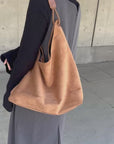 Suède round taught bag
