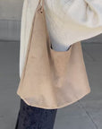 Suède round taught bag