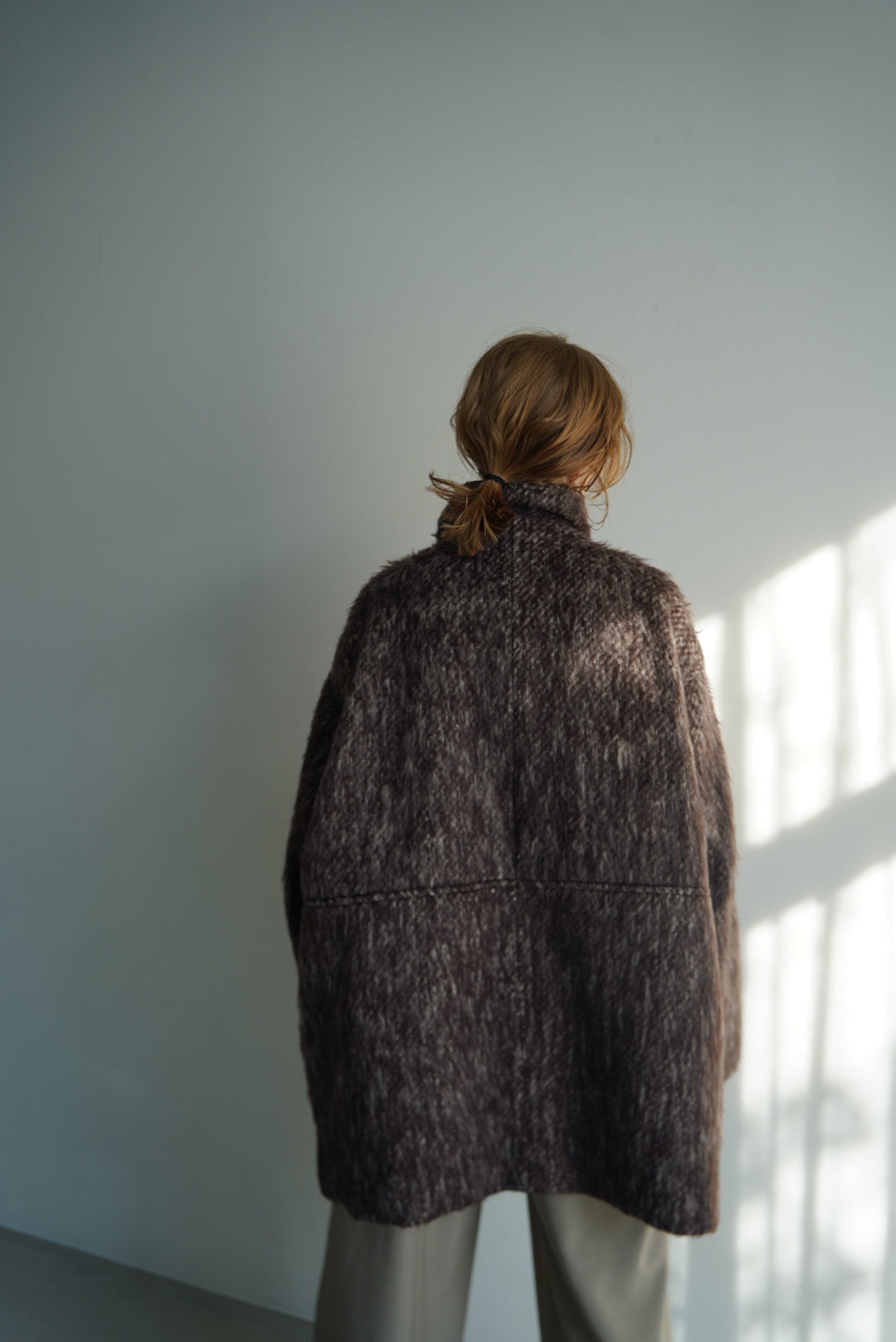 Stand shaggy over coat