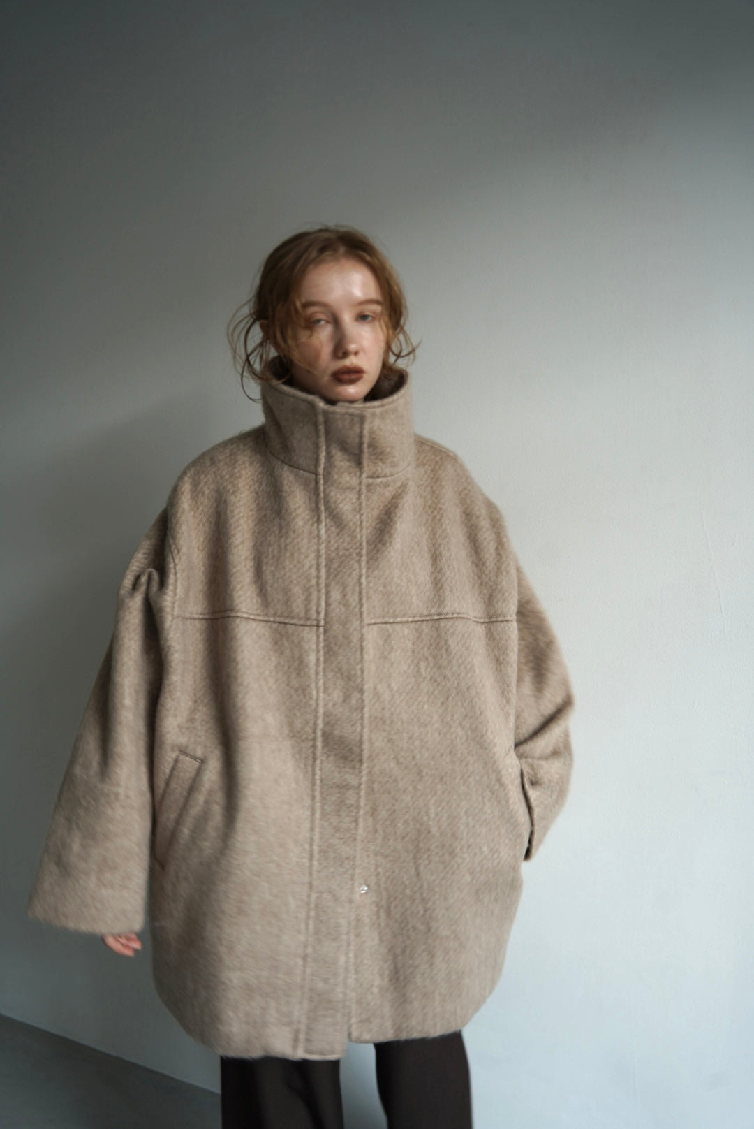 Stand shaggy over coat