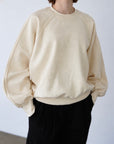 Curve sleeve sweat pullover