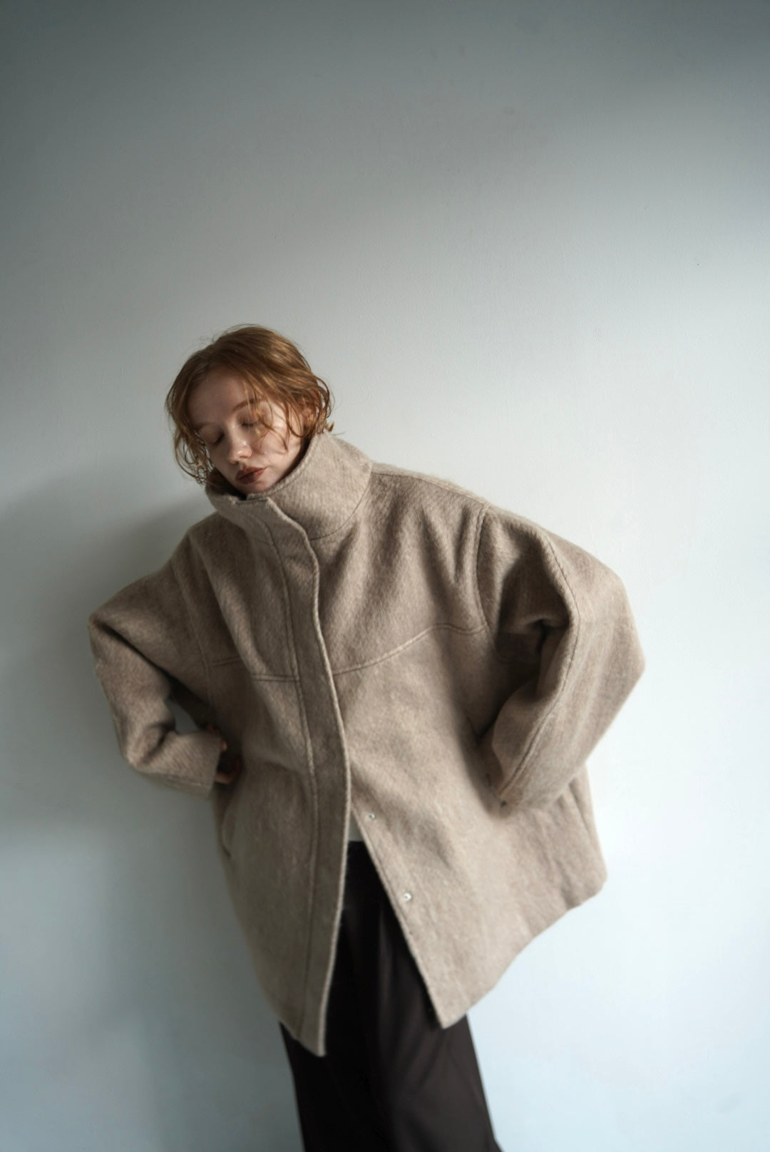 Stand shaggy over coat