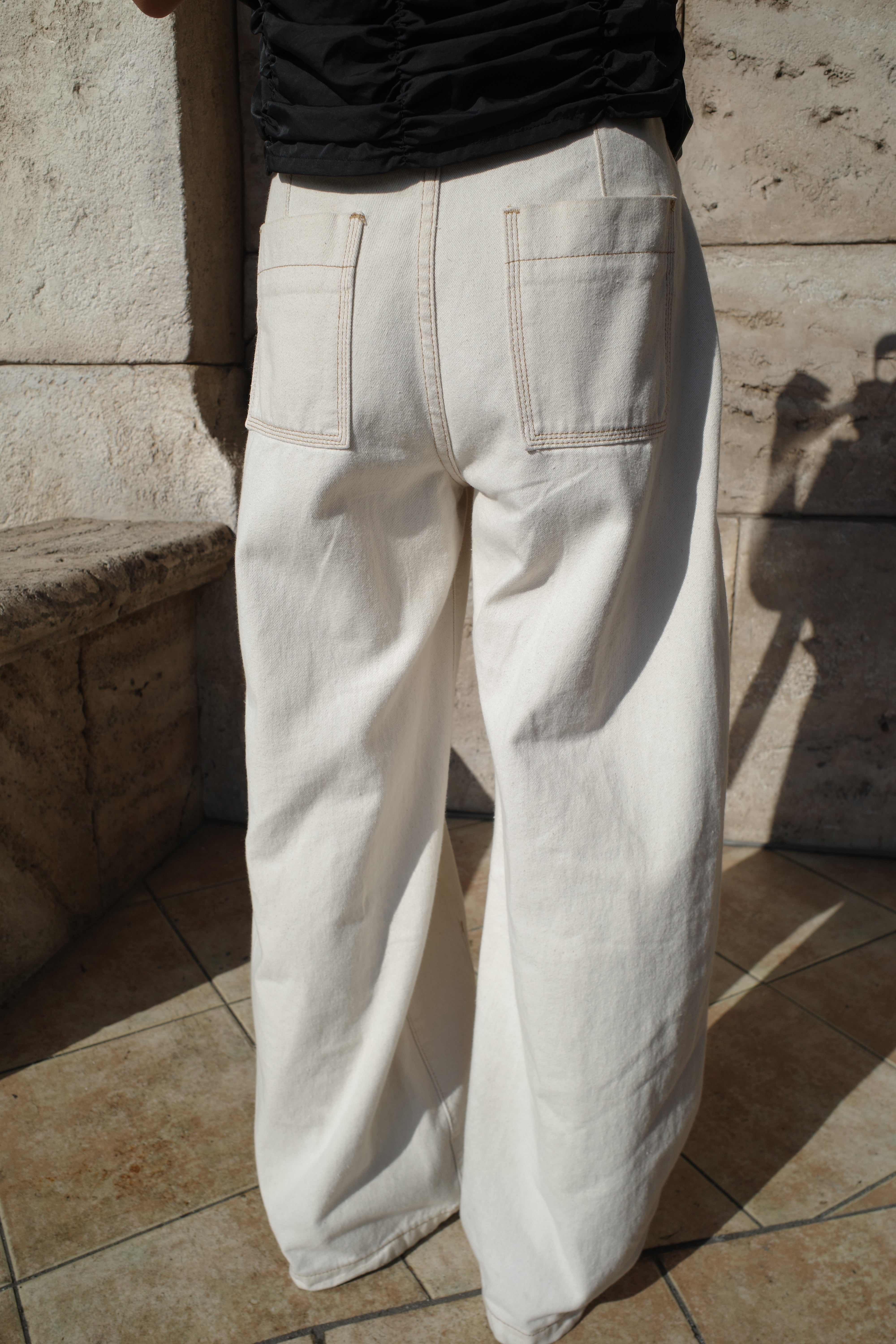 Belt curve denim pants