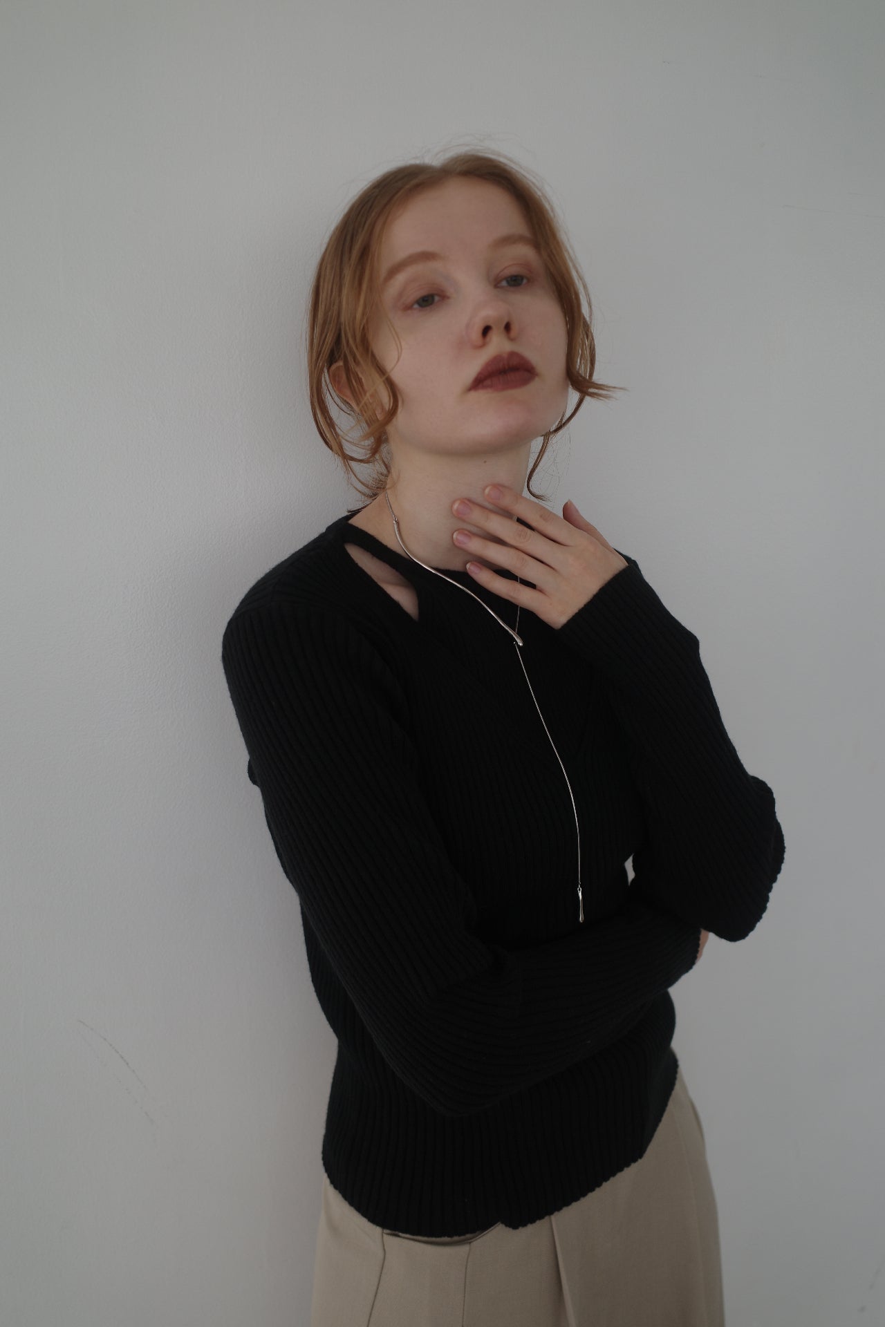 Layered design knit tops