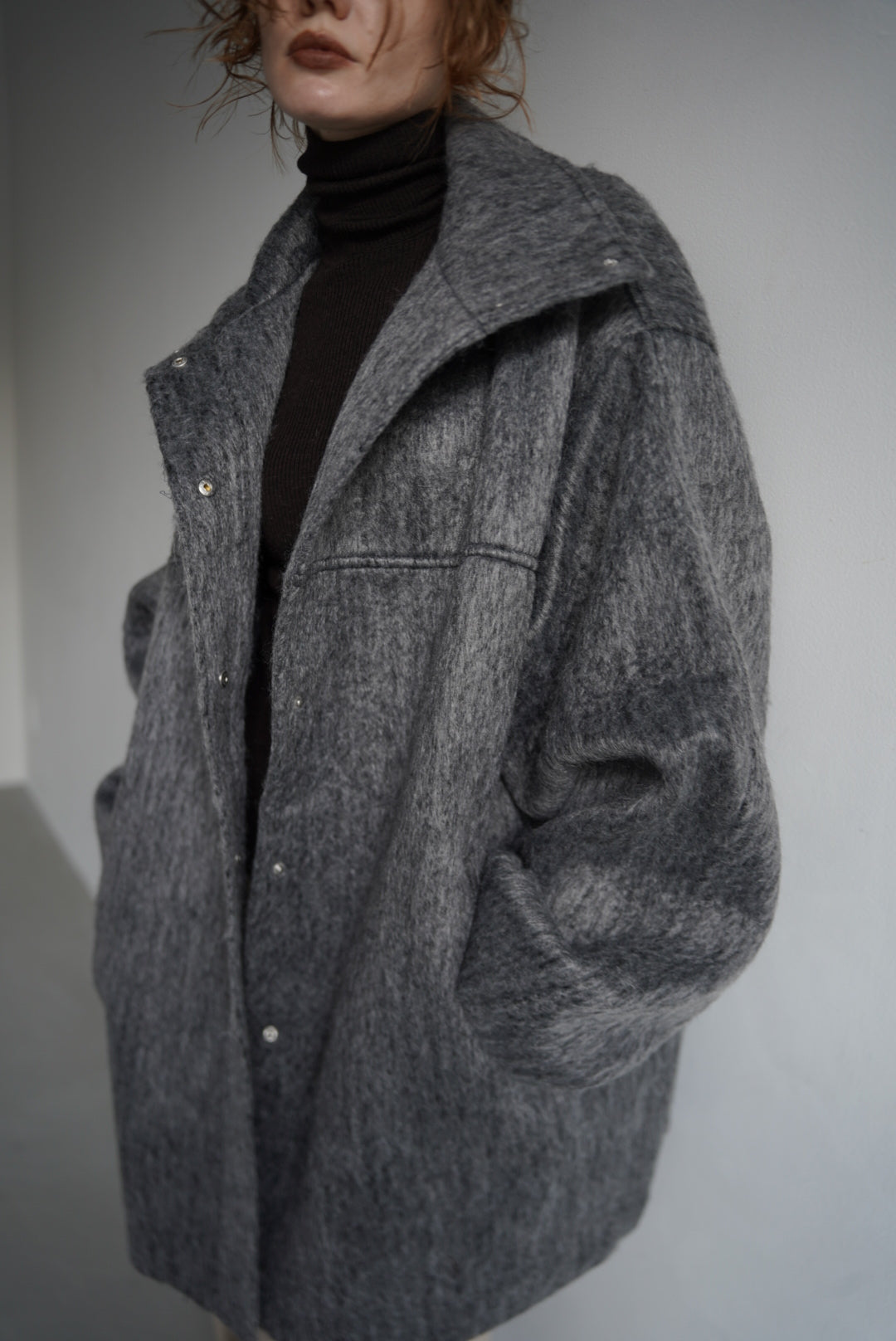 Stand shaggy over coat