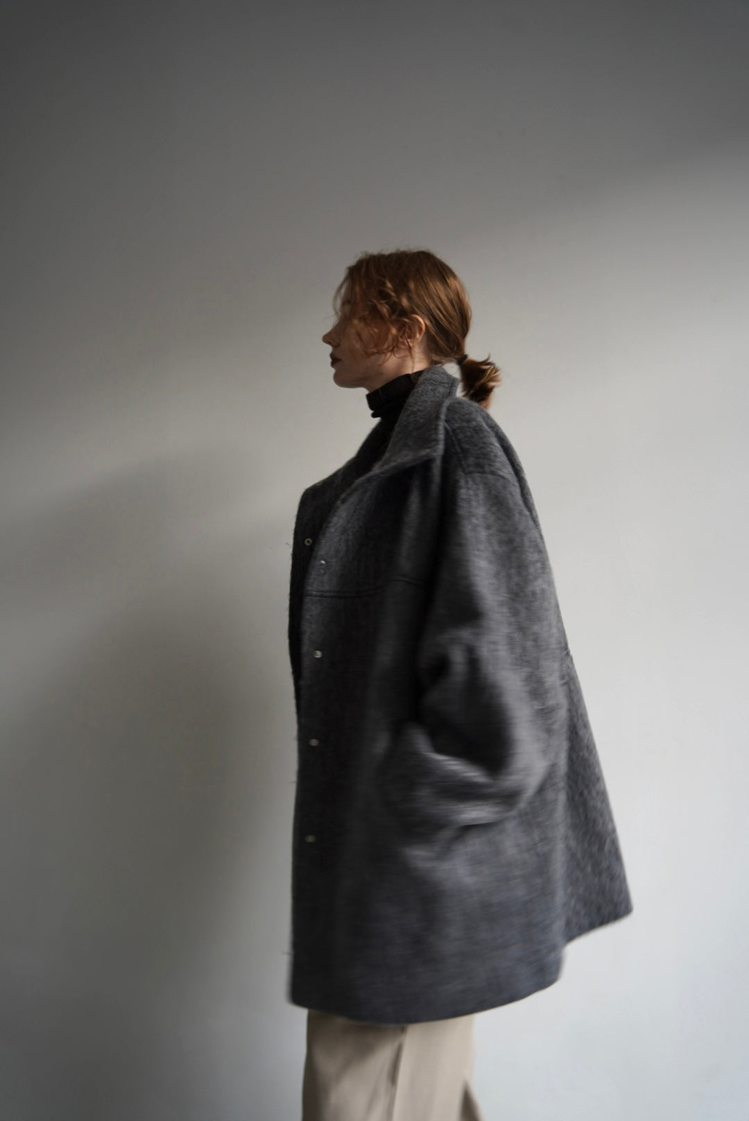 Stand shaggy over coat