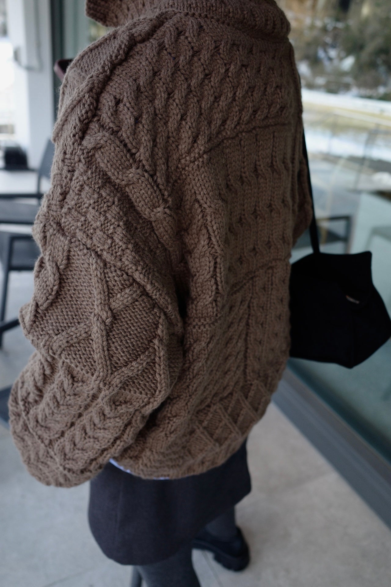 Asymmetric cable knit