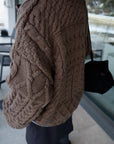 Asymmetric cable knit