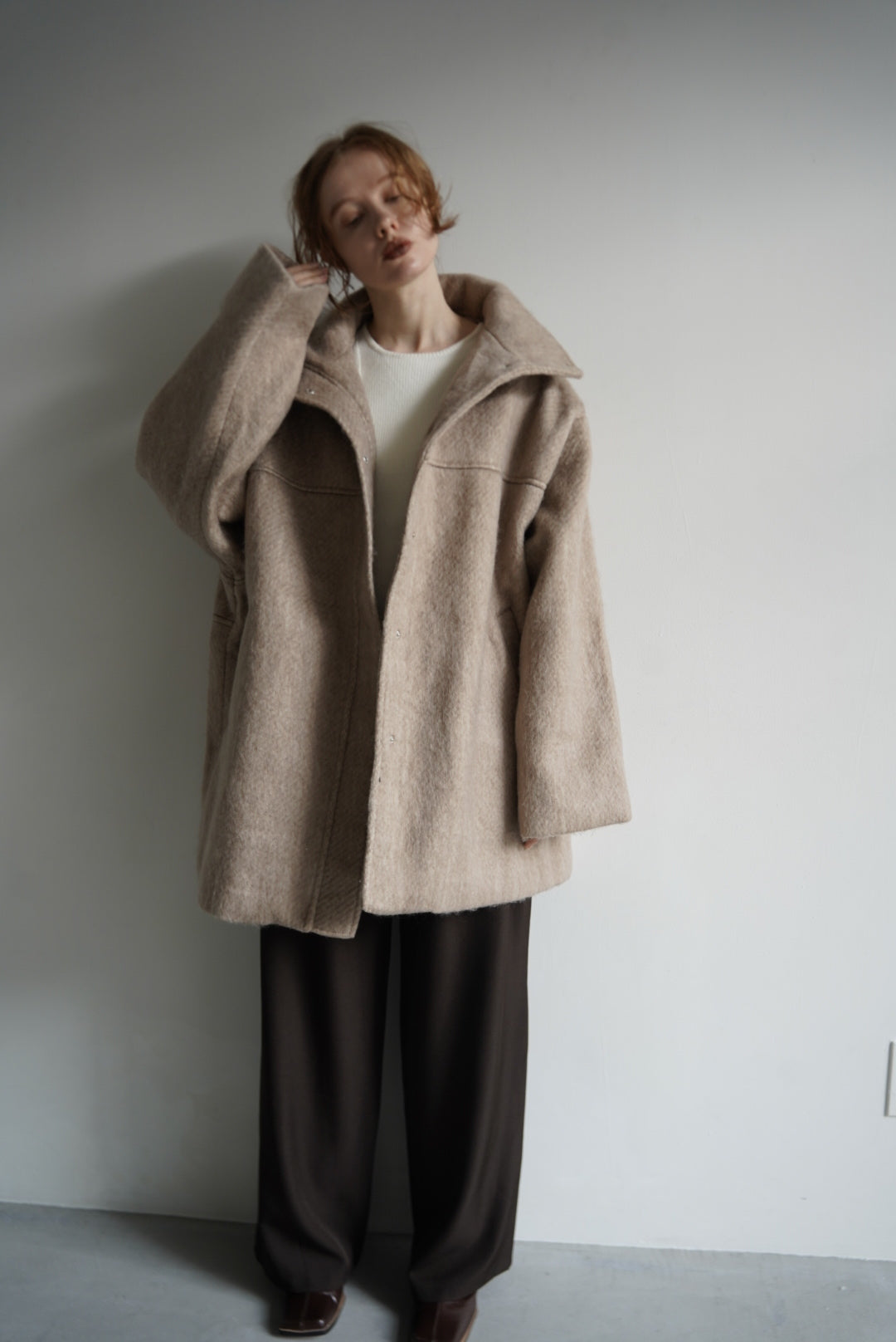 Stand shaggy over coat