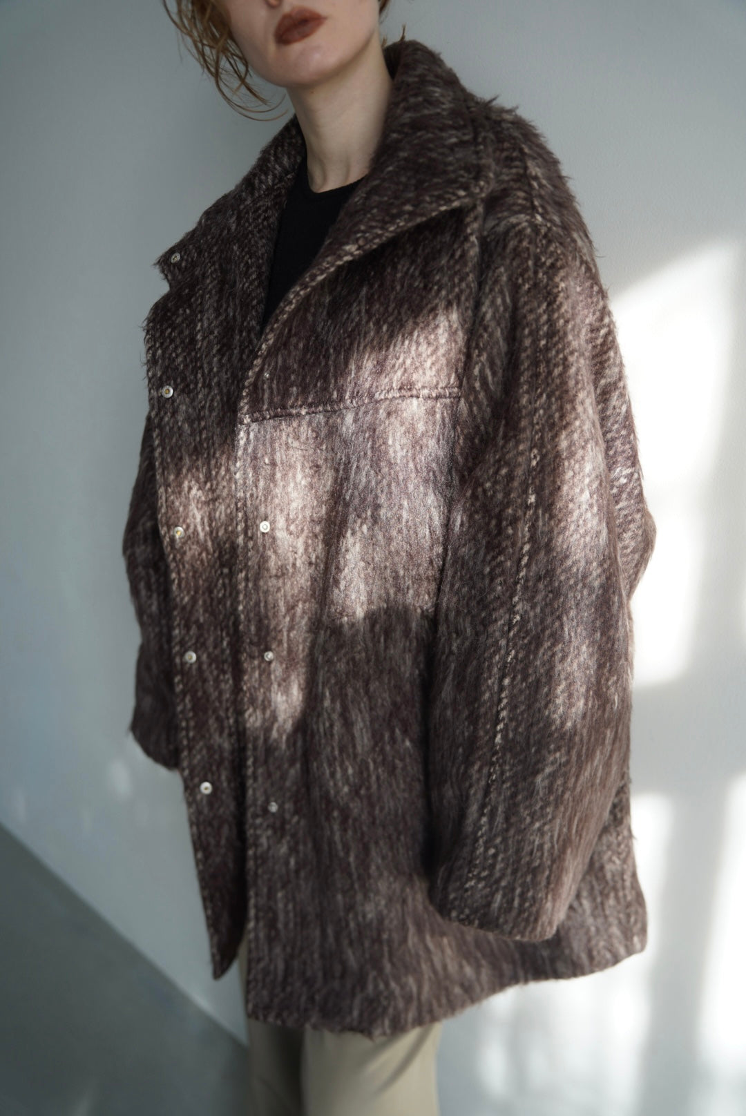 Stand shaggy over coat