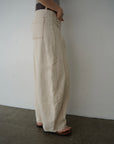 Belt curve denim pants