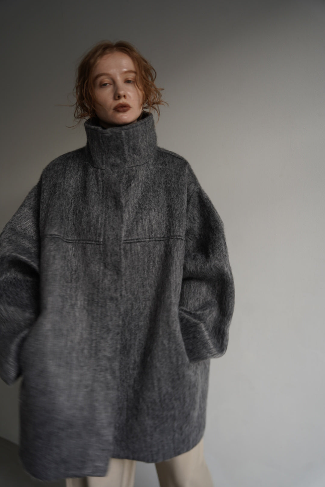 Stand shaggy over coat