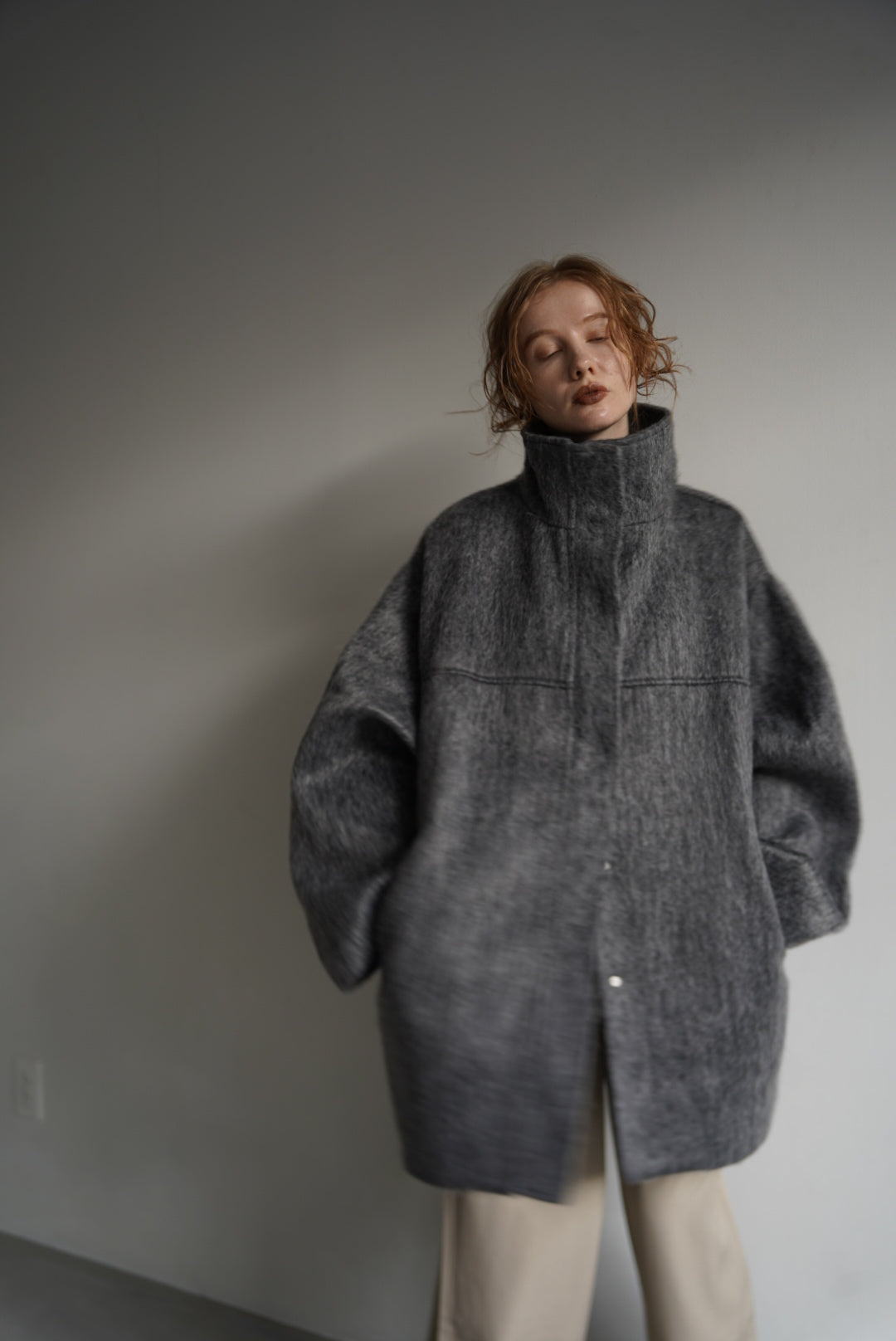 Stand shaggy over coat