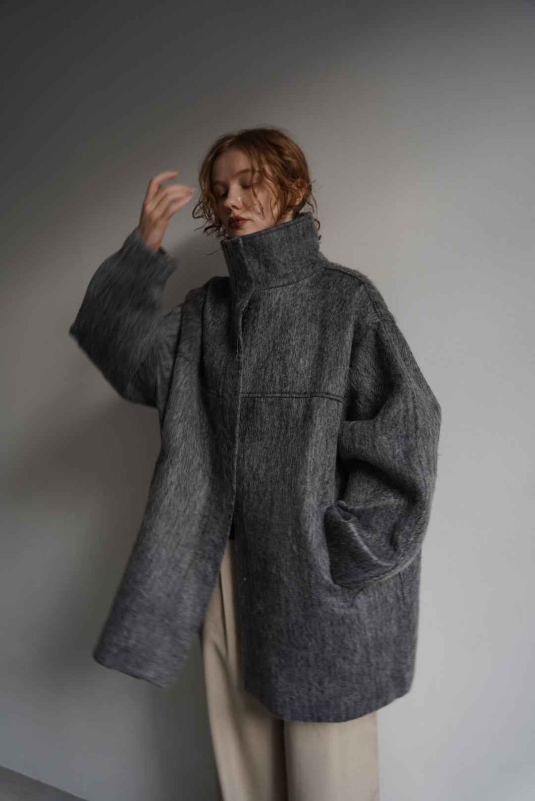 Stand shaggy over coat