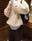 Asymmetric cable knit
