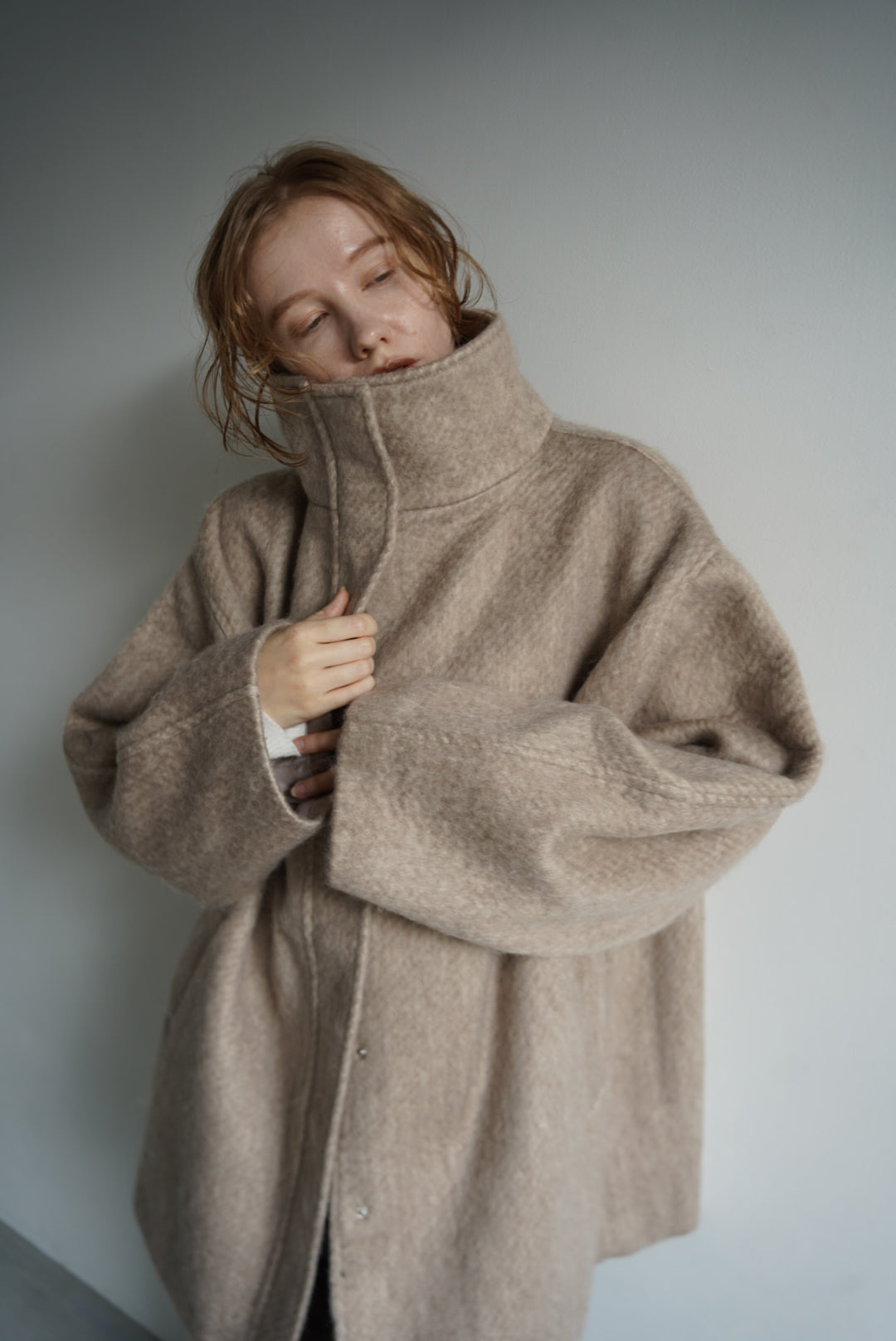 Stand shaggy over coat